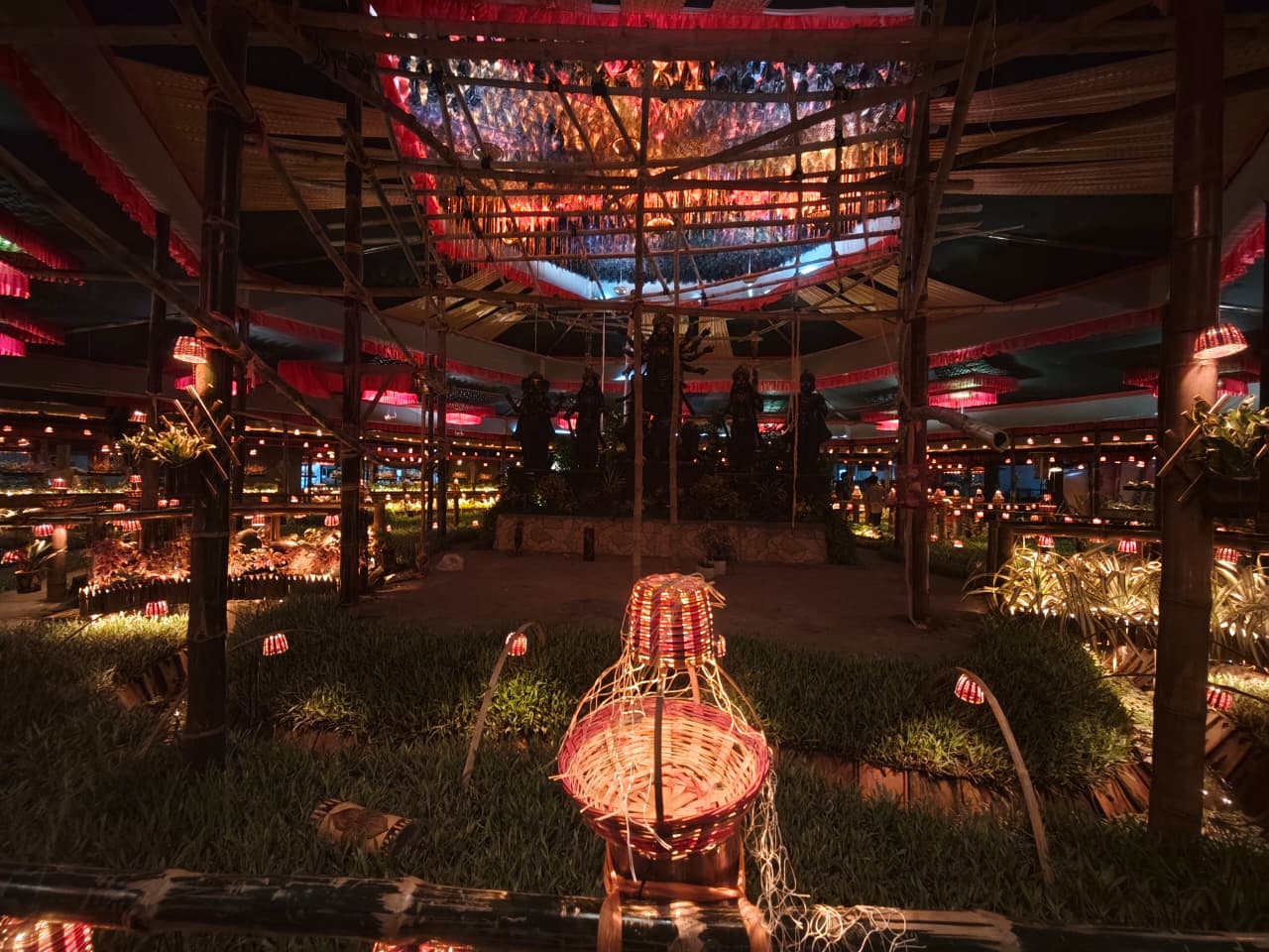 Central pathway with a woven basket lantern in the foreground